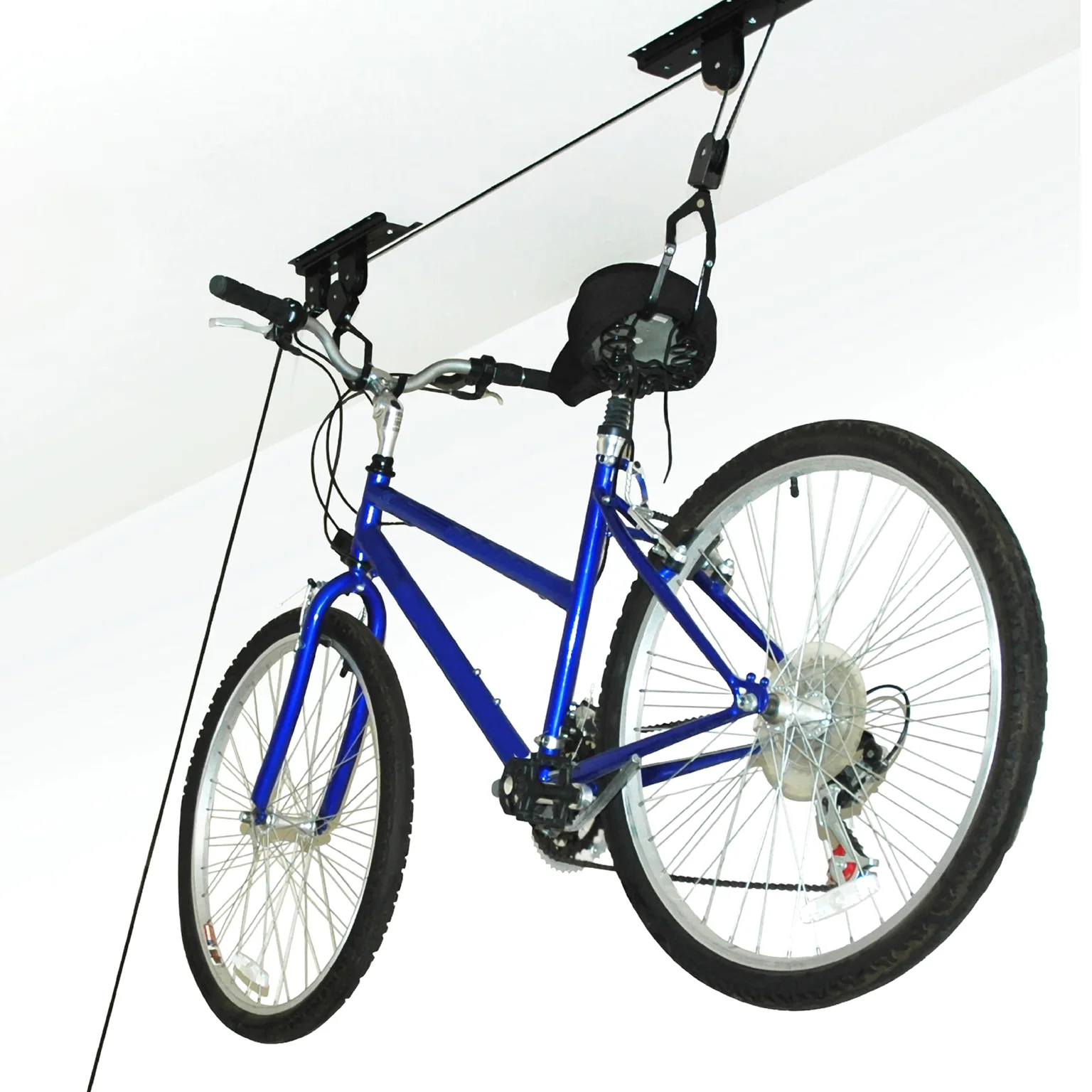A road bike lifted by its wheels on a black RAD Sportz Bike Hoist.