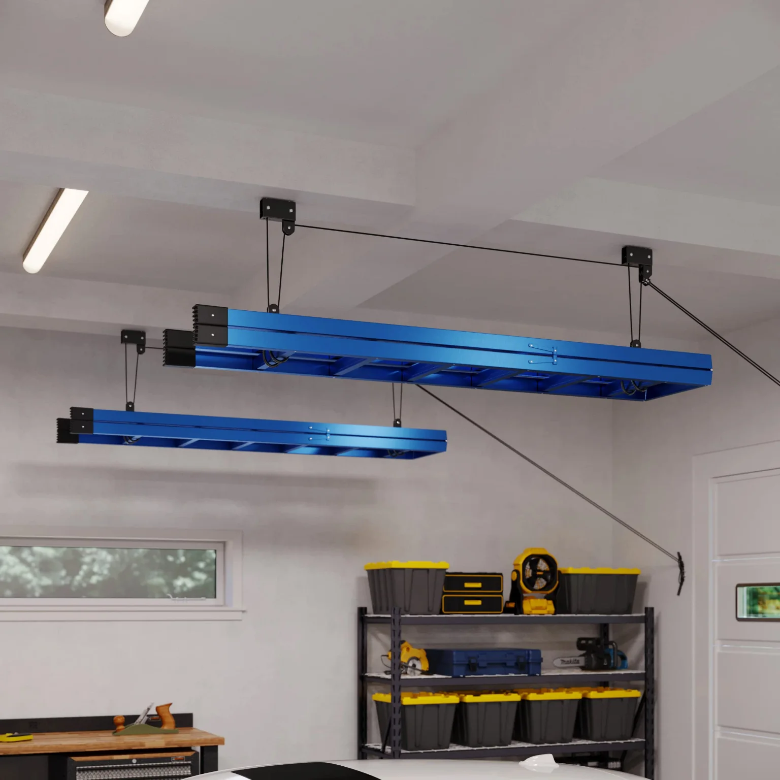 A ladder raised on a RAD Sportz hoist under a garage ceiling